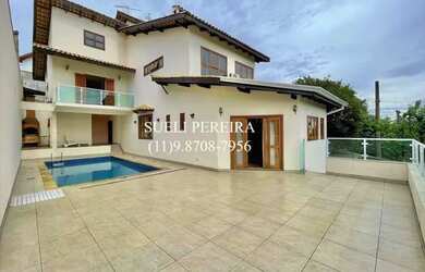 Imagem 2: Casa de condomínio para venda possui 356 metros quadrados com 4 quartos