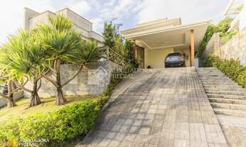 Imagem 1: Casa de condomínio para venda tem 337 metros quadrados com 3 quartos