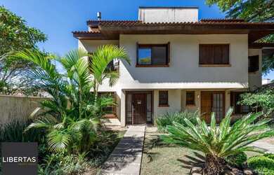 Imagem 2: Casa em condomínio com 3 dormitórios, suíte e 2 vagas