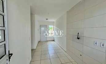 Imagem 7: Casa geminada com portão fechado para locação