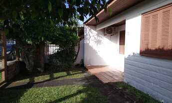 Imagem 4: Rainha do Mar. Casa com 3 dormitórios, 2 banheiros. 4 quadras do mar