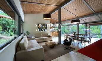 Imagem 7: Casa de condomínio para venda possui 383 metros quadrados com 5 quartos