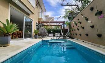 Imagem 5: Casa de condomínio a 50 metros do mar com 5 suítes e piscina privativa