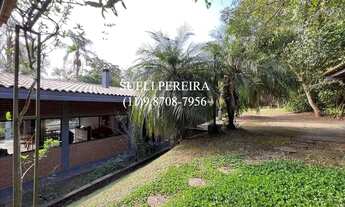 Imagem 3: Casa de condomínio para venda possui 383 metros quadrados com 5 quartos