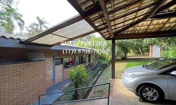 Imagem 2: Casa de condomínio para venda possui 383 metros quadrados com 5 quartos