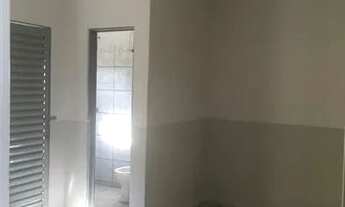 Imagem 2: Suíte com cozinha integrada e área de serviço (kitnet