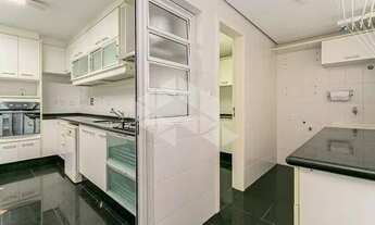 Imagem 2: Apartamento semimobiliado com vista para o mar, 3 dormitórios sendo 2 suítes, 2 vagas