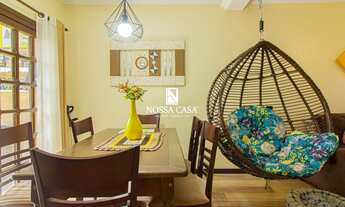 Imagem 2: Sobrado geminado com 03 dormitórios, sendo 01 suíte na Stan em Torres/RS