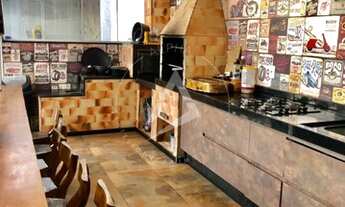 Imagem 5: Casa 3 salas, 2 cozinhas, 5 suítes sendo a suíte principal com mais de 50 metros