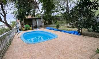 Imagem 5: Chácara à venda em Guarapari-ES: Oportunidade em Andana com 2 quartos, sala de estar e TV