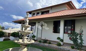 Imagem 2: Casa com três dormitórios no Desvio Rizzo