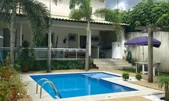 Imagem: Casa com 4 suites e deck com piscina em