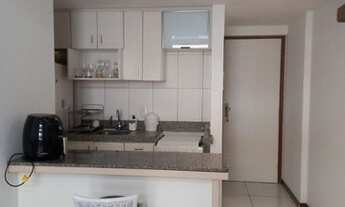 Imagem 6: Vendo Loft alto padrão com um quarto com vista para Baia de todos os Santos no corredor da