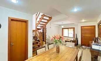 Imagem 4: Casa em Porto Alegre, no bairro Tristeza, com 3 dormitório(s), e 3 banheiros, à