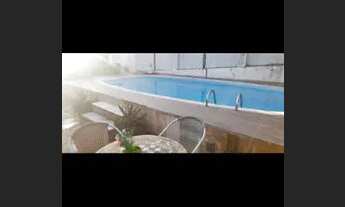 Imagem 3: Casa para venda tem 220 metros com 4 quartos e piscina e sauna