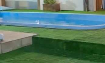 Imagem 4: Casa ampla com piscina para temporada em Torres.