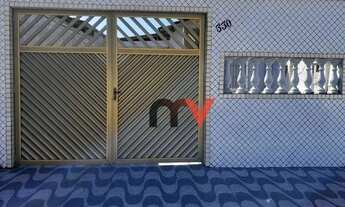 Imagem 2: Casa de frente com Quintal, 2 vagas de garagem, sala, 1 quarto ,cozinha , banheiro.banheir