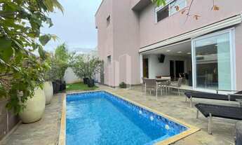 Imagem 2: Jardins Valência Sobrado de Alto Padrão com 4 Suítes, Lazer Privativo e Atmosfera Moderna