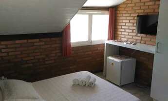 Imagem 7: Pousada a 60 m da Praia da Daniela aluga suítes