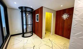 Imagem 2: Casa a Venda Estilo Porteira fechada, no Ecoville, 3 Suítes, Piso Aquecido, Elevador - Zon