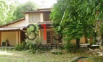 Imagem 7: Excelente Terreno 4000 m2 bem localizado frente murada com pequena casa frente para a estr