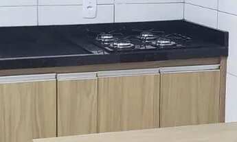 Imagem 6: Kitnet com armários e fogão