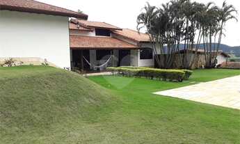 Imagem 6: Magnifica casa em condomínio fechado com 04 dormitórios, edícula e 6 vagas para autos