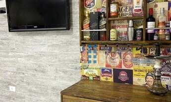 Imagem 4: Sobrado com área de churrasqueira, vaga coberta, terraço no fundo