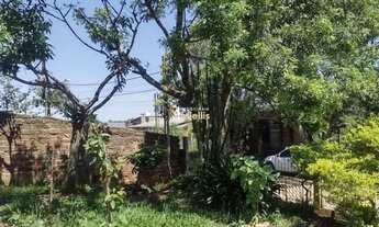 Imagem 4: Terreno com uma casa de madeira no Jardim Fiuza em Viamão REF