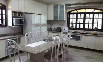 Imagem 7: Magnifica casa em condomínio fechado com 04 dormitórios, edícula e 6 vagas para autos