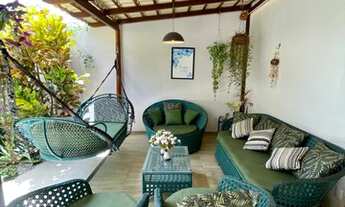 Imagem 4: Casa de esquina com um jardim belíssimo no condomínio Villagio Harmony Residence