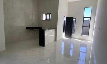 Imagem: Casa com três quartos sendo dois suítes