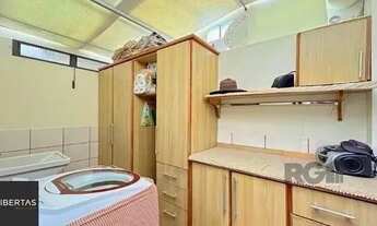 Imagem 7: Casa em Porto Alegre, no bairro Tristeza, com 3 dormitório(s), e 3 banheiros, à