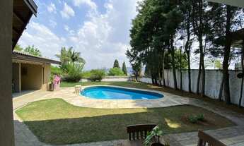 Imagem 7: Casa de condomínio para venda possui 556 metros quadrados com 4 quartos