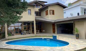 Imagem 4: Casa de condomínio para venda possui 556 metros quadrados com 4 quartos