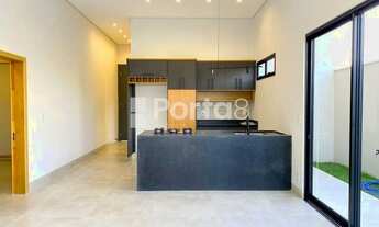 Imagem 5: Viva o Sonho da Vida Contemporânea: Casa Sofisticada com Piscina e Ambientes Planejados no