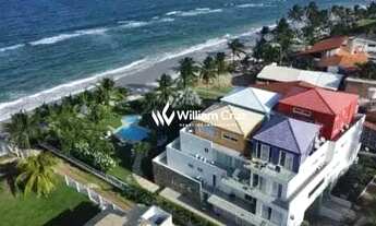 Imagem: Pé na areia da praia dos carneiros