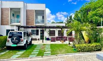 Imagem: Casa de esquina com um jardim belíssimo