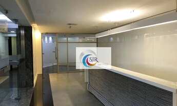 Imagem 5: Laje comercial de 775 m² com carpete e divisórias. 9 banheiros. Ar condicionado. 21 vagas