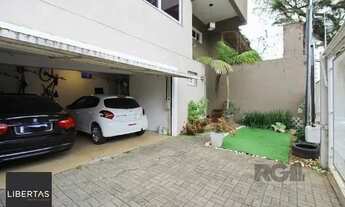 Imagem 6: Casa em Porto Alegre, no bairro Tristeza, com 3 dormitório(s), e 3 banheiros, à