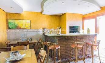 Imagem 6: Casa de condomínio para venda possui 288 metros quadrados com 3 quartos