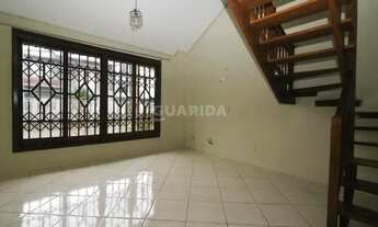 Imagem 2: Casa em condomínio para alugar com 3 dormitórios sendo 1 suíte no Bairro Cavalhada