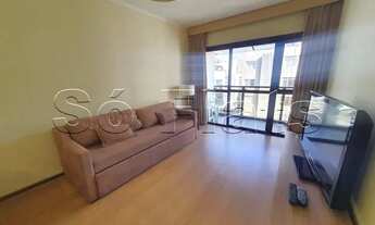 Imagem 3: Flat mobiliado com arrumação de quarto, com cozinha completa com geladeira grande. Sem bur