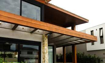 Imagem 3: Casa alto padrão com 4 suítes à venda, 322m², em condomínio fechado com acesso exclusivo à