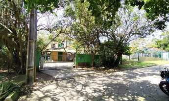 Imagem 4: ?? Pé na Areia! Terreno de 1.809 m² com 2 casas na Praia do Santinho - Florianópolis