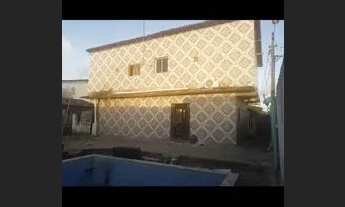 Imagem: Terreno com 5 casas para venda