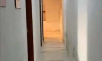 Imagem 7: Casa com piscina e salão de festas com churrasqueira