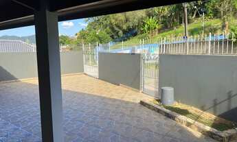 Imagem 2: NO CENTRO / PORTEIRA FECHADA