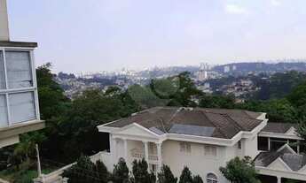 Imagem 6: Sobrado em condomínio em fase de construção, rua com cancela e guarita, subida Serra da Ca