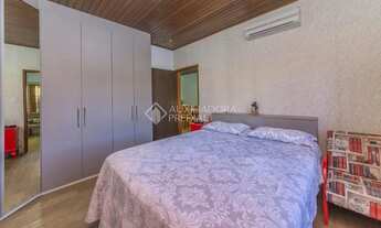 Imagem 5: Casa 3 dormitórios (2 suítes), 2 vagas garagem churrasqueira 128 m2 em Vila Ipiranga